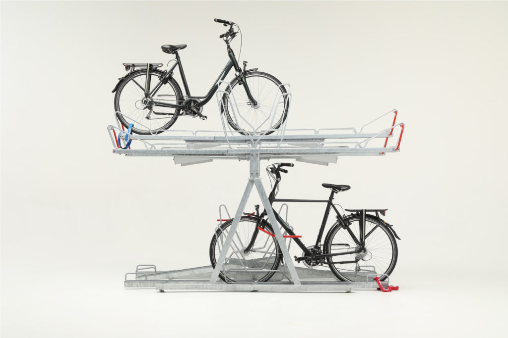 Rendering av Cyklos OPTIMA tvåvåningsställ i dubbelsidigt utförande med två cyklar på olika plan